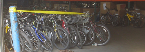 Bikes imprisoned, perhaps on trumped-up charges. Photo by Jym Dyer.