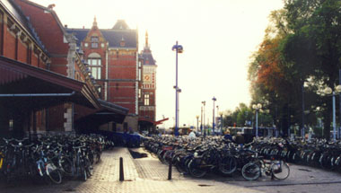 Bike parking at a train station in Amsterdam. Photo by Jym Dyer.