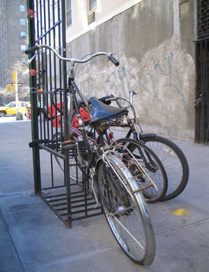 A window guard used to park bikes. Photo by Jym Dyer.